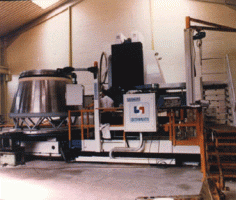 Fiber locating and filament winding machine